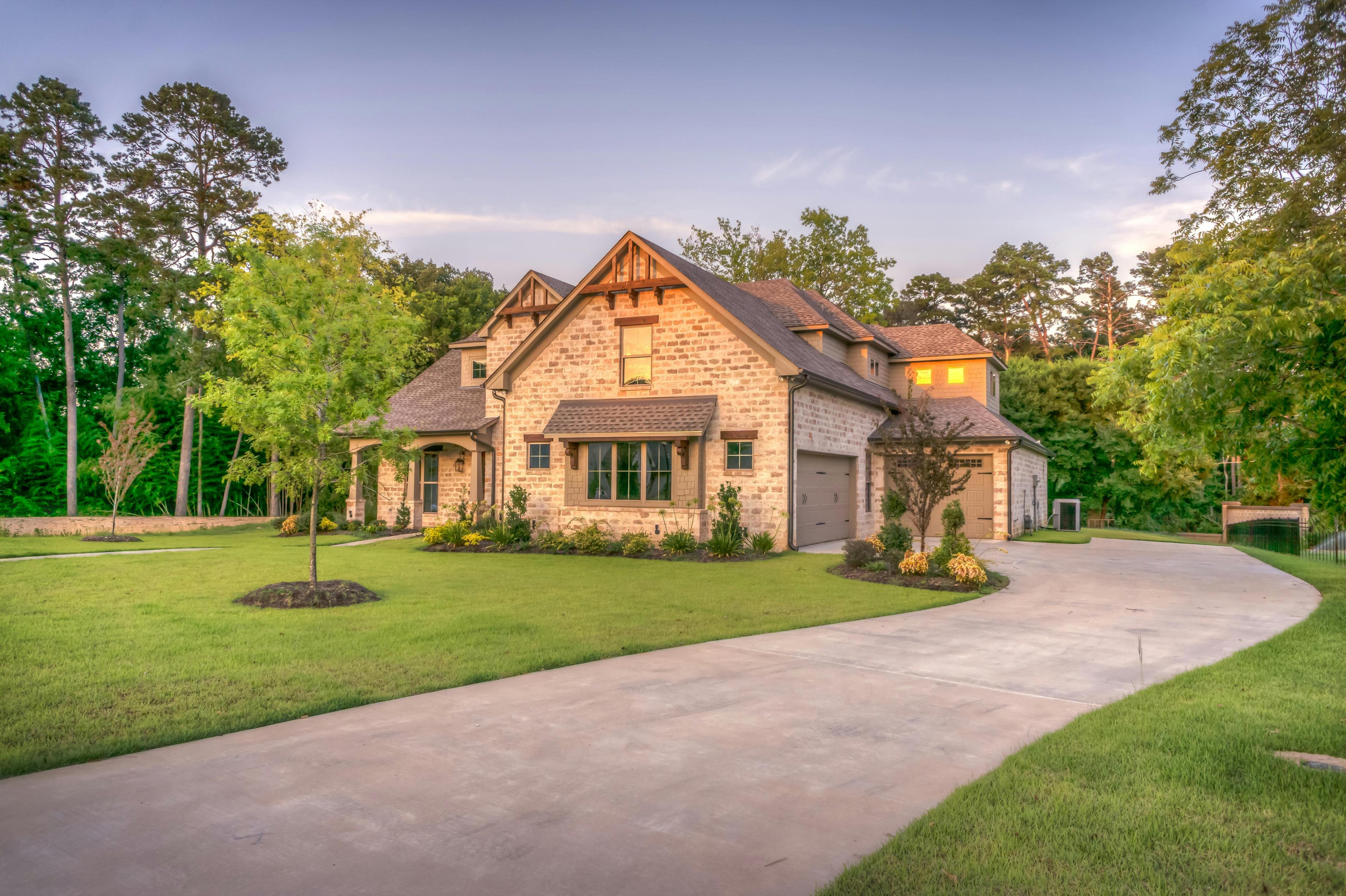 A luxurious modern house exterior at dusk